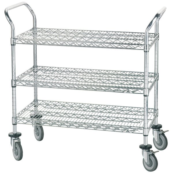 An Advance Tabco three-tiered metal utility cart with poly casters.