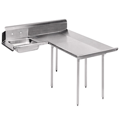 A stainless steel L-shaped dishtable with a sink in the corner.