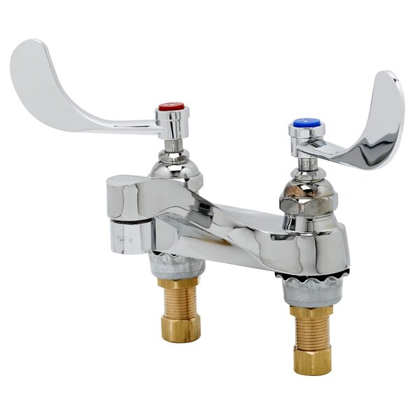 A chrome T&S deck mount medical faucet with 4" wrist action handles.