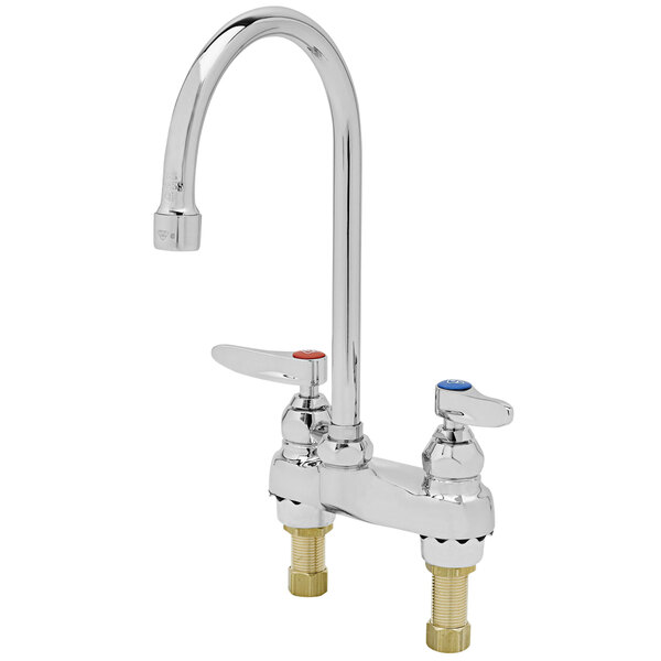 A chrome T&S deck mount medical faucet with two gooseneck faucets and red and blue knobs.