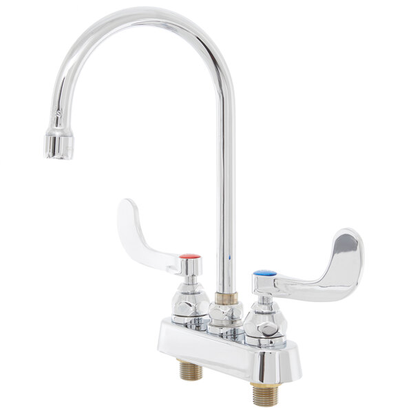 A chrome T&S deck-mount faucet with gooseneck spout and wrist action handles.