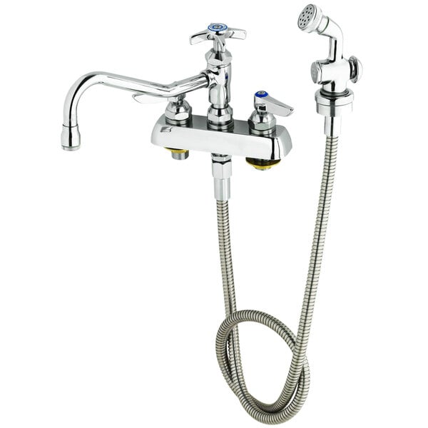A T&S chrome deck-mount faucet with angled spray valve and hose.