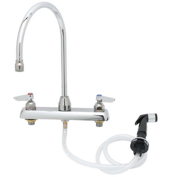 A chrome T&S deck-mount faucet with sidespray hose.