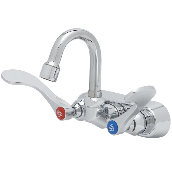 A T&S chrome wall mount faucet with 4" wrist action handles.