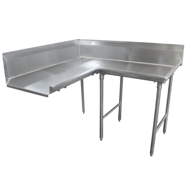 An Advance Tabco stainless steel L-shaped dishtable with a metal corner.