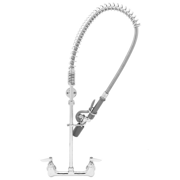 A T&S chrome wall mounted pre-rinse faucet with a curved silver hose.