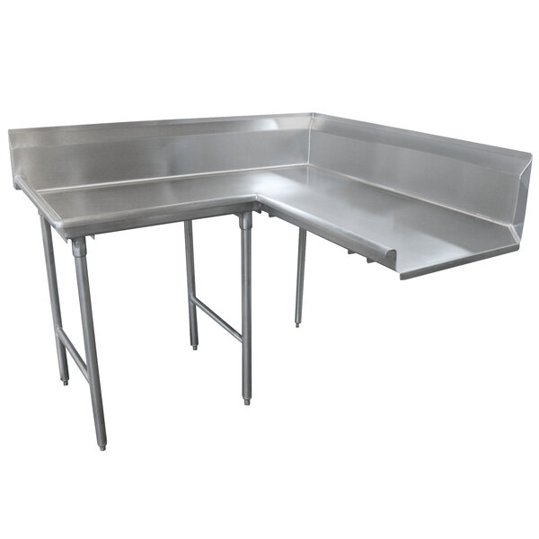 An Advance Tabco stainless steel L-shape dishtable with two legs.