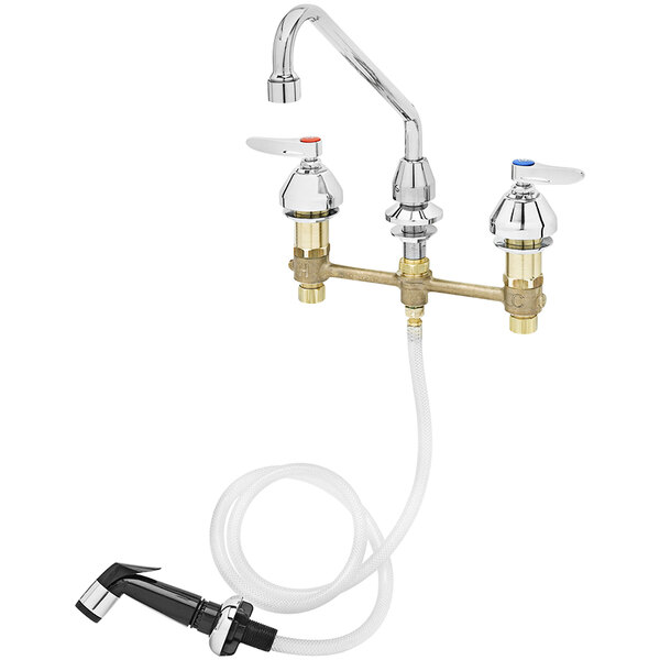 A T&S deck-mount kitchen faucet with a side spray hose.