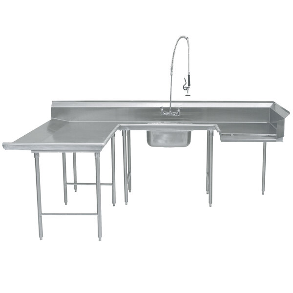 A stainless steel U-shaped dishtable with a faucet over a sink.