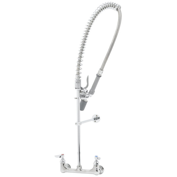 A silver T&S pre-rinse faucet with a hose attached.