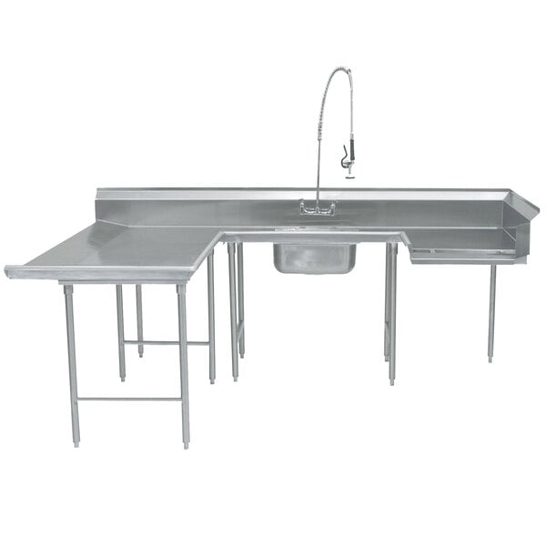 A stainless steel U-shaped dishtable with a sink, drain, and faucet.