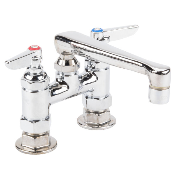A close-up of a T&S chrome deck-mount faucet with two handles.