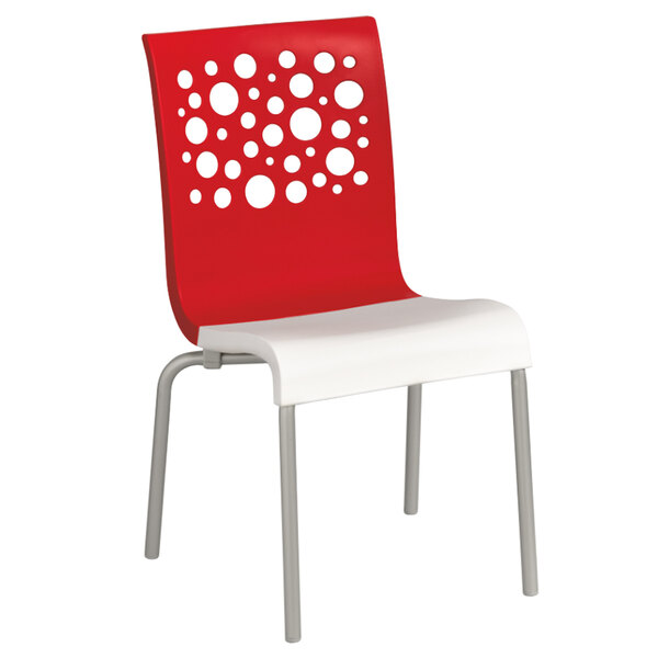 A Grosfillex Tempo outdoor restaurant chair with a red back and white seat.
