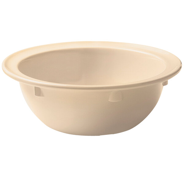 A tan melamine bowl with a white interior.