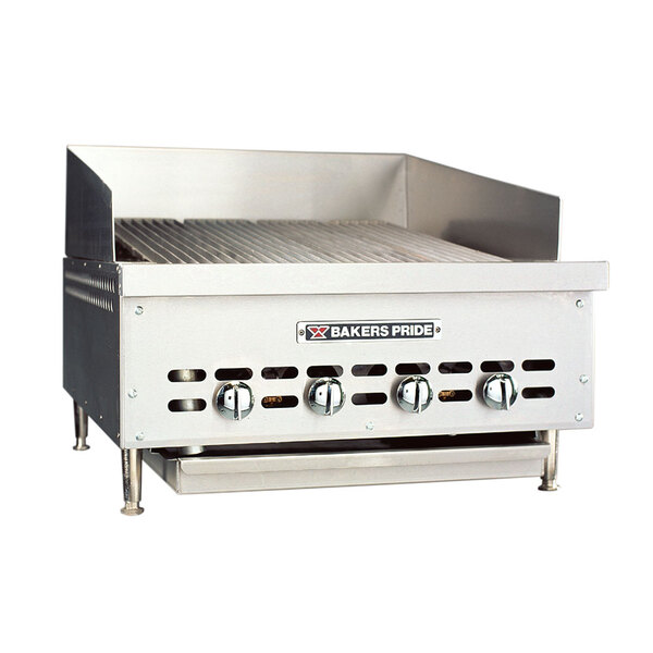 A Bakers Pride stainless steel countertop charbroiler with three burners and knobs on top.