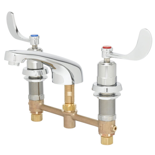 A white T&S metering faucet with 2 wrist action handles.