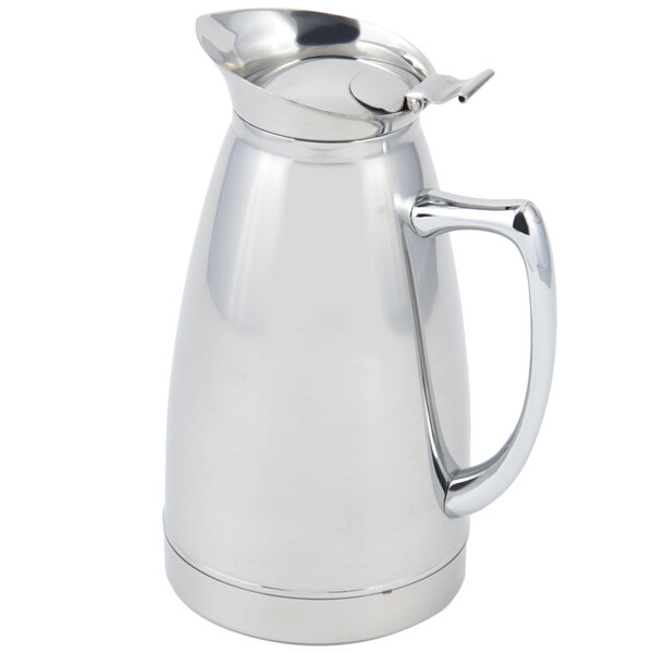 A Bon Chef stainless steel coffee server with a handle.