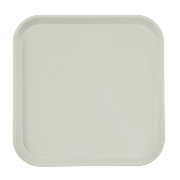 A white square Cambro tray with a black border.