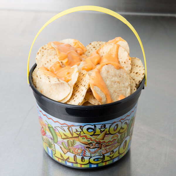 A 48 oz. plastic nacho bucket filled with chips and cheese sauce.