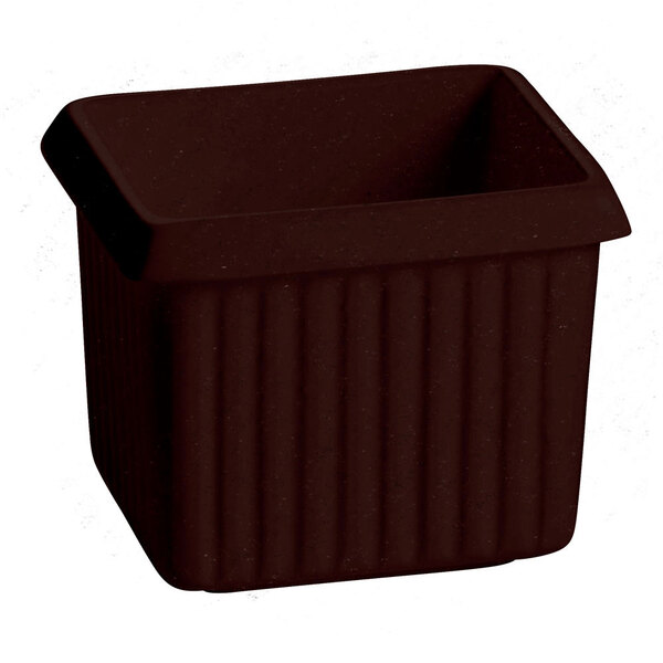 A brown rectangle container with ridges on the top.