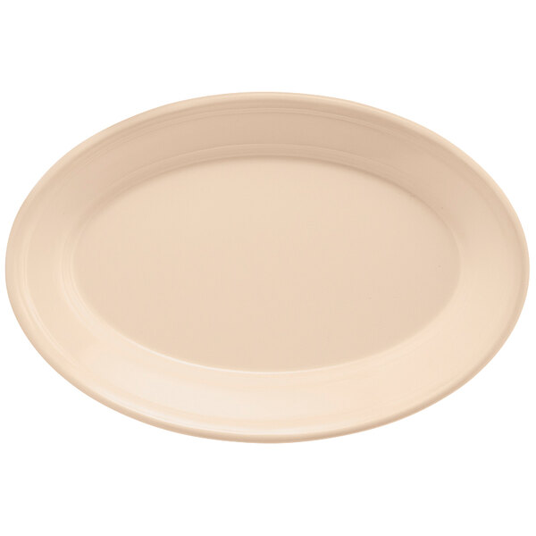 A tan SuperMel oval platter with a white background.