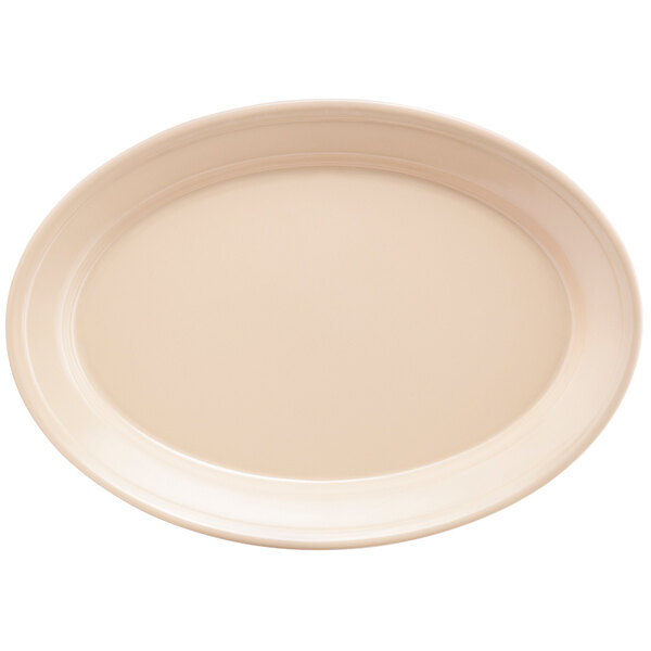 A tan oval platter with a white surface and a tan border.