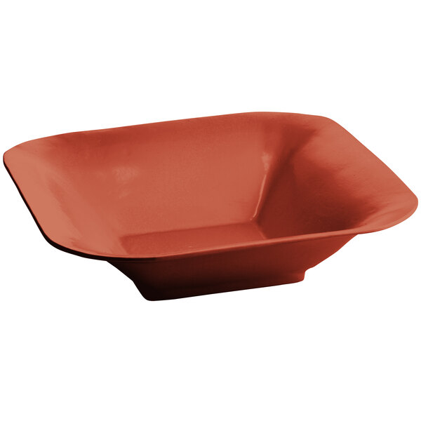 A copper Tablecraft square bowl with a red lid.