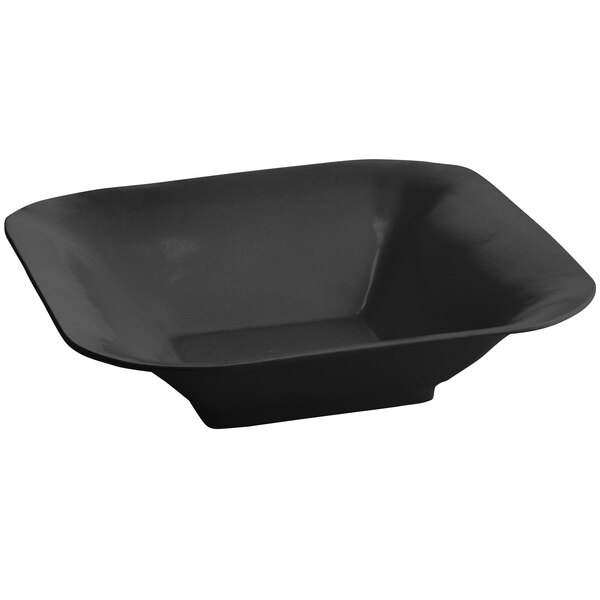 A Tablecraft black cast aluminum square bowl on a counter in a salad bar.