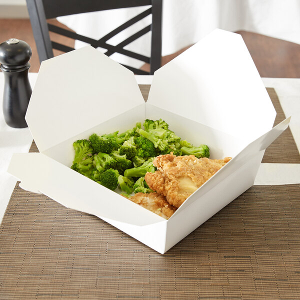 A white Fold-Pak Bio-Pak take-out box filled with broccoli and chicken.