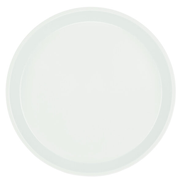 A close-up of a white Cambro fiberglass tray with a white rim.
