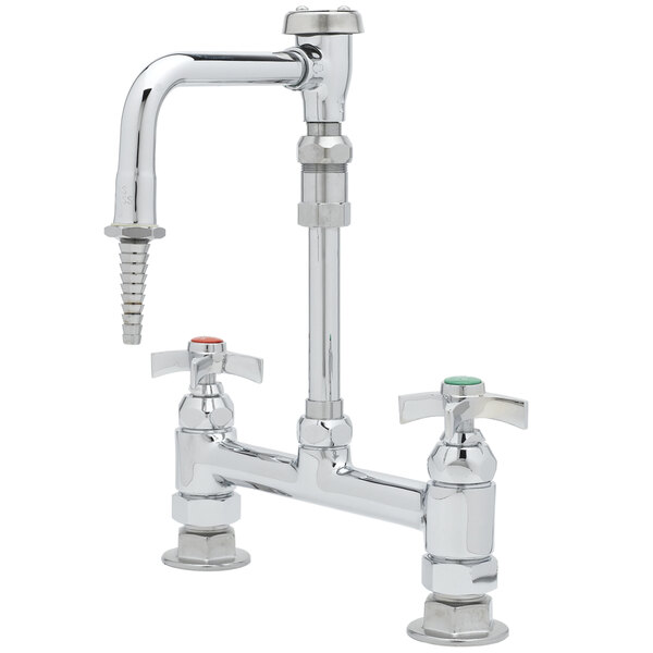 A chrome T&S deck mount faucet with 4 arm handles and a serrated tip.