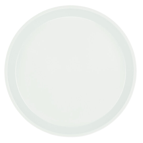 A close-up of a white Cambro round tray with a white rim.