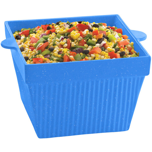 A blue square Tablecraft bowl filled with a mix of vegetables.