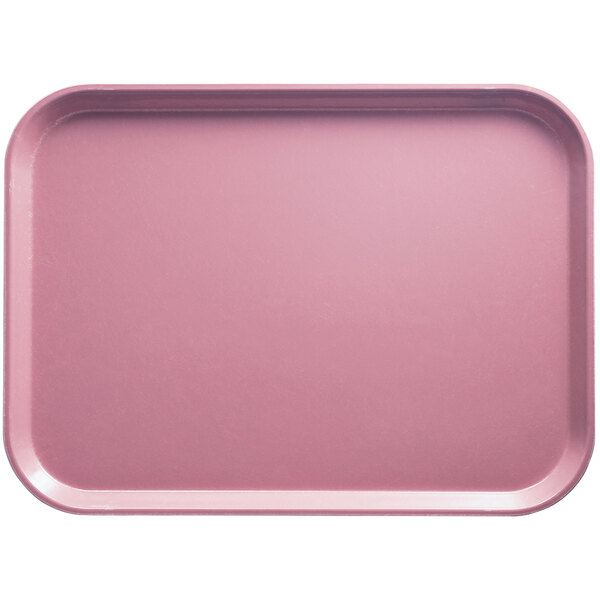 A pink Cambro rectangular tray with a white background.