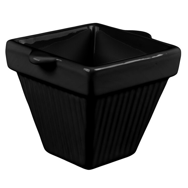 A black square Tablecraft condiment bowl with a handle.
