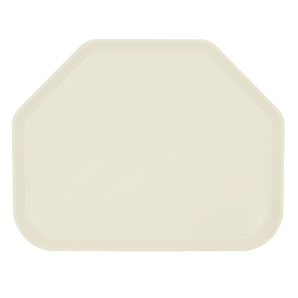 A white fiberglass trapezoid tray with a hexagon shape in the middle.