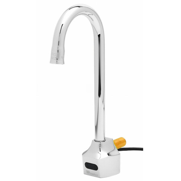 A silver faucet with a yellow sensor on the end.