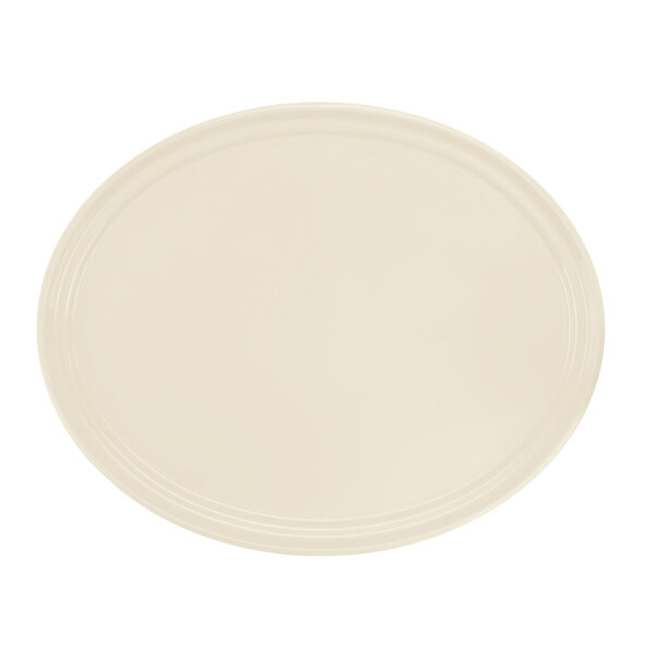A white oval Cambro tray with a white border.