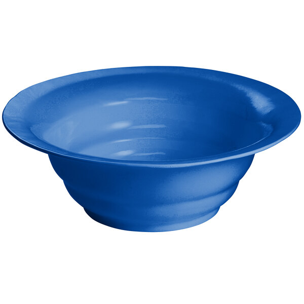 A Tablecraft cobalt blue cast aluminum salad bowl with a wide rim.