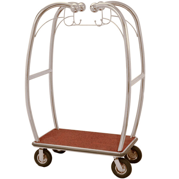A stainless steel Aarco luggage cart with red carpet on it.