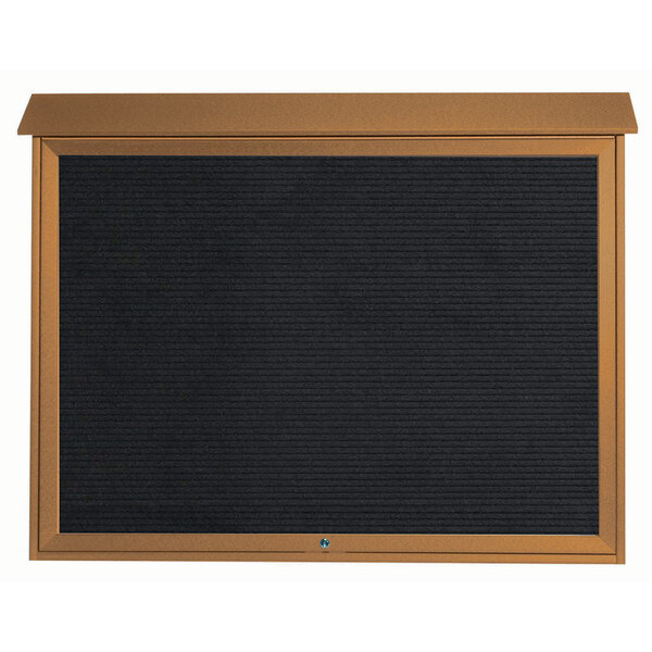 A brown rectangular board with a black frame.
