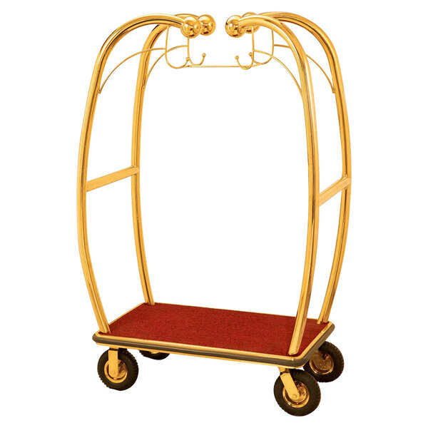 A stainless steel luggage cart with brass finish and red accents.