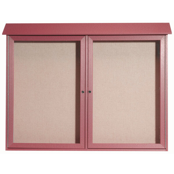 A red cabinet with two rosewood enclosed bulletin boards with vinyl tackboards and two doors.