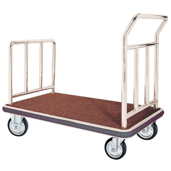 A stainless steel Aarco luggage cart with metal rails and a brown carpet surface.