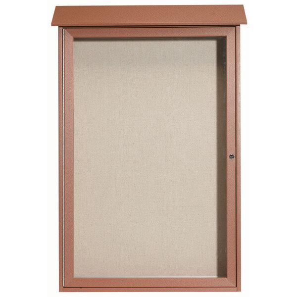 A brown metal enclosed bulletin board with a single hinged door.