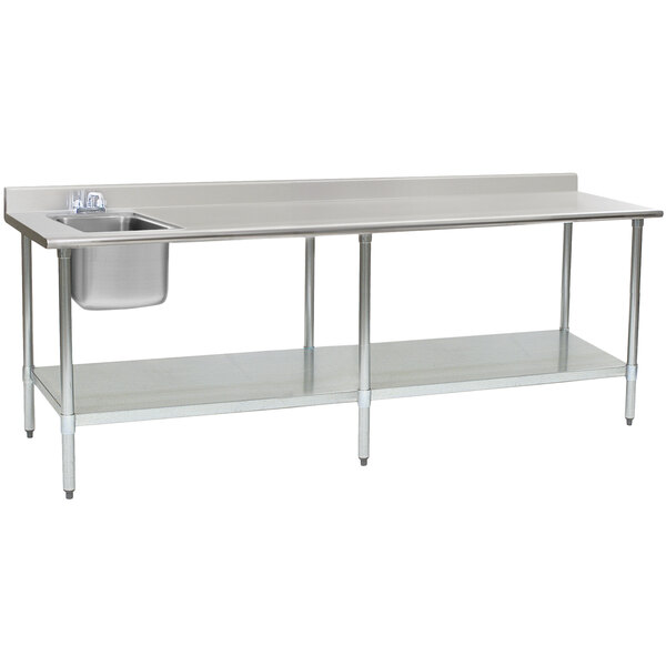 A stainless steel Eagle Group work table with a sink on the left and a shelf.