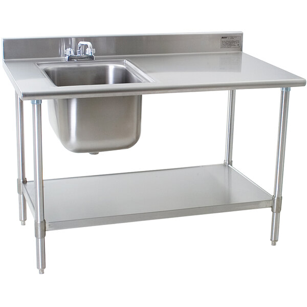 A stainless steel Eagle Group work table with a sink on the left.