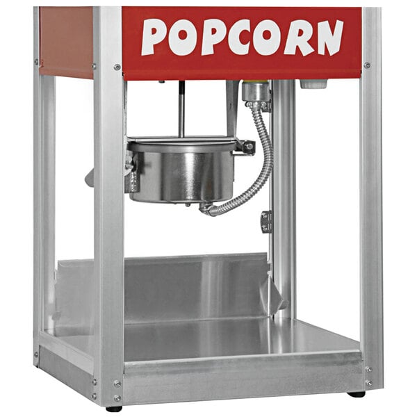 A Paragon Thrifty Pop popcorn popper with a red bowl and silver base.