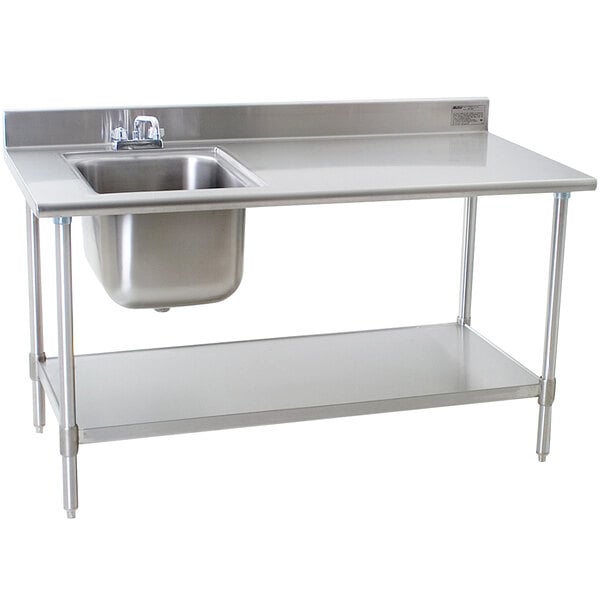 A stainless steel Eagle Group work table with a sink on the left.