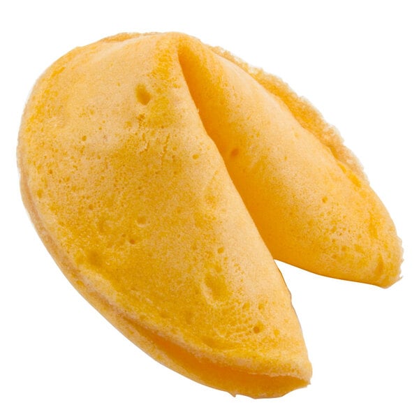 A close-up of a yellow Super K Panda Fortune Cookie with a fortune inside.